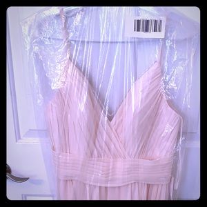 Beautifully simple gown.